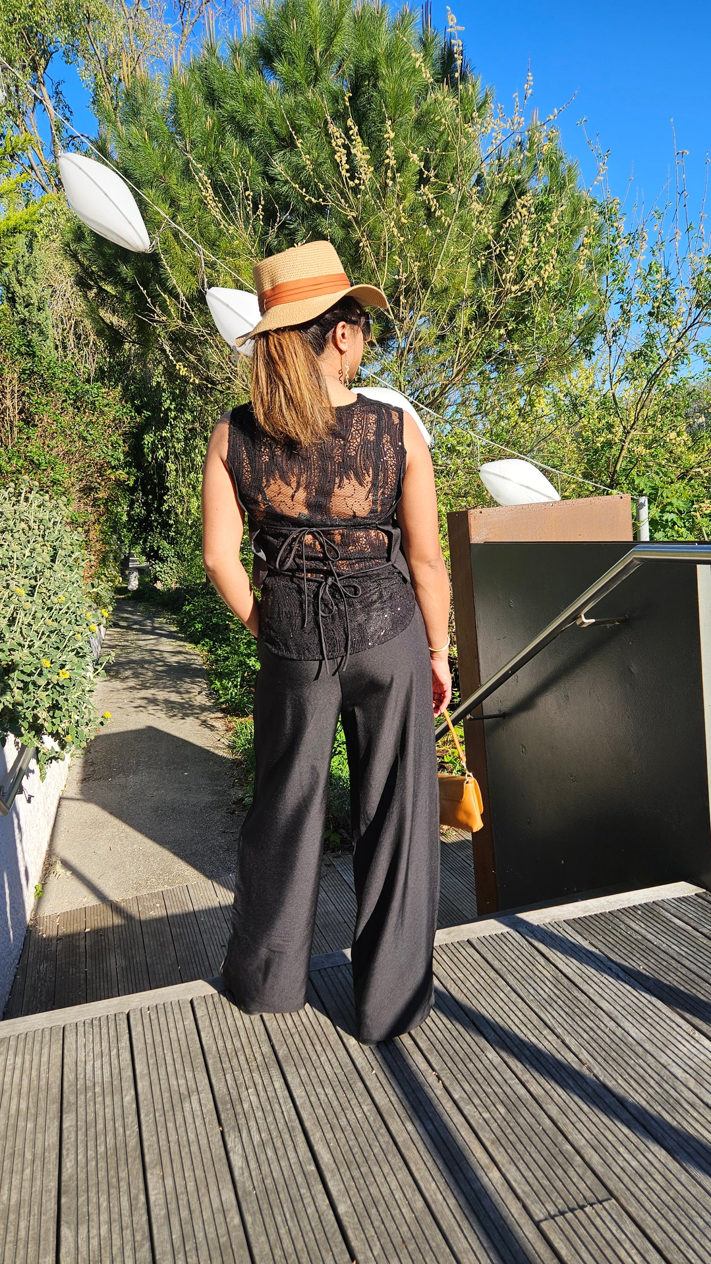 Ensemble gilet sans manche et pantalon Bally.
